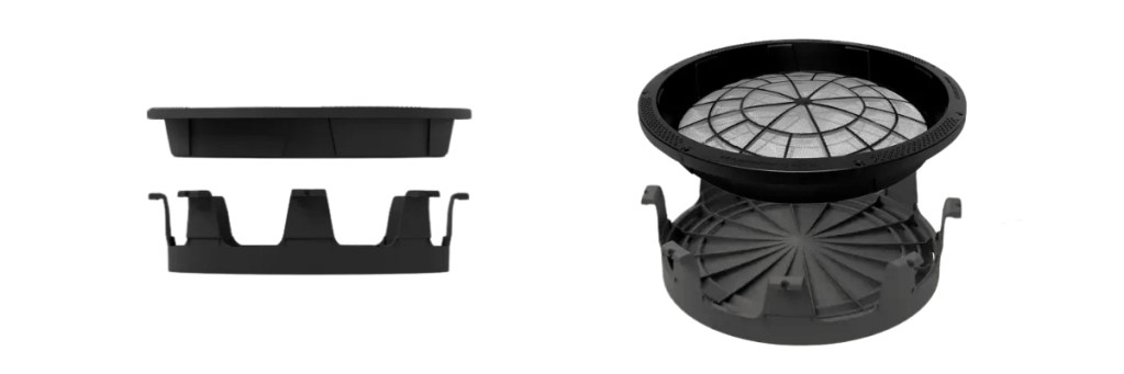 Three black plastic components of a filtration system displayed separately: a top piece, a middle section with slots, and a bottom base with a circular filter design.
