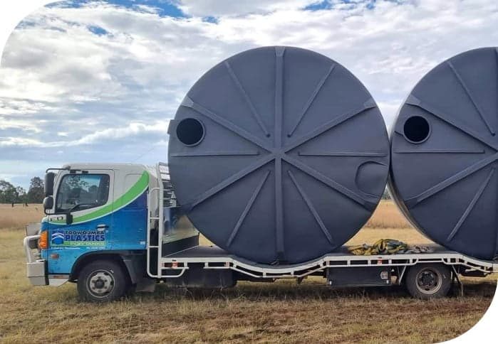 Two huge water tanks on a trailer truck — Water Tanks & Accessories in Toowoomba City, QLD