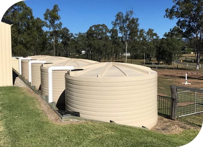 Cream Rainwater Tanks in Toowoomba, QLD